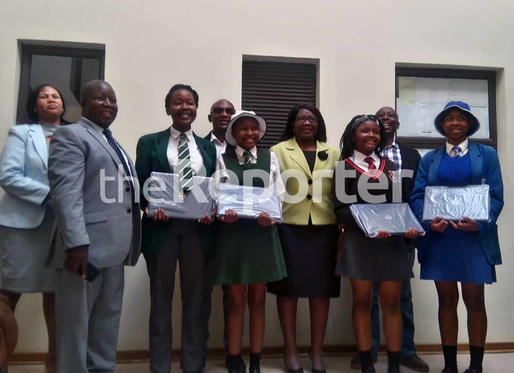Female learners receive laptops