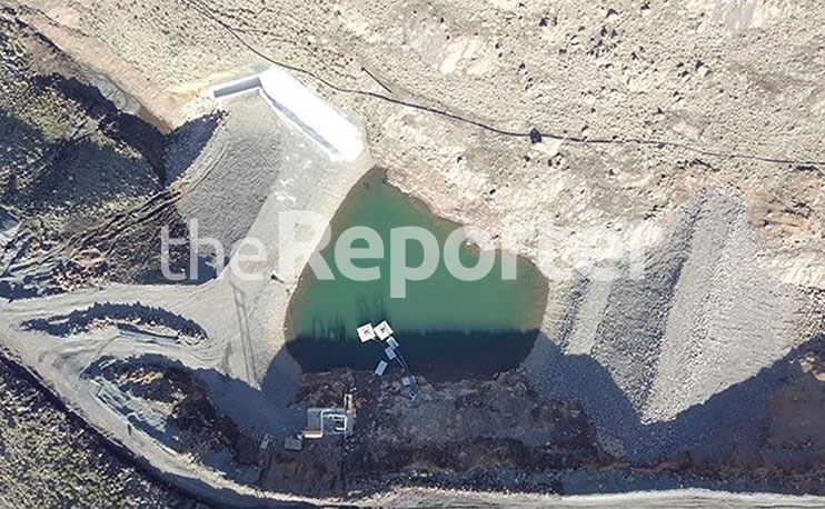 Mine, community smoke peace pipe