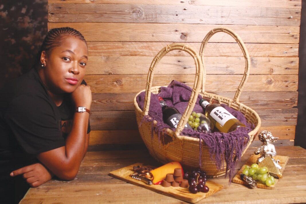 Maphathe keeps her foot on wine peddle