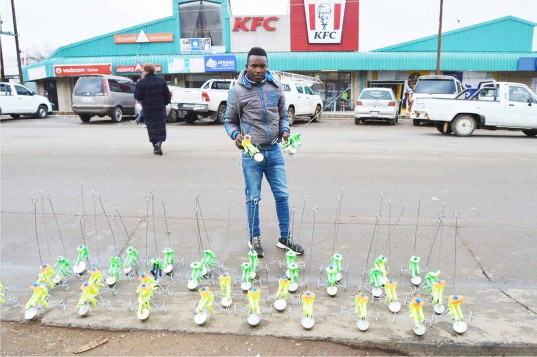 Koetlisi makes toys for a living