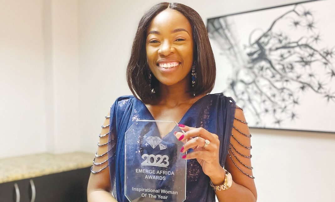 Model flies Lesotho flag high